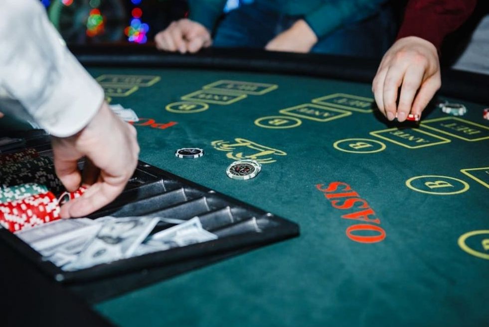 Private celebration with casino-style tables and warm lighting